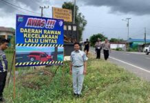 Langkah Proaktif Jasa Raharja Kalsel dalam Pemasangan Spanduk di Titik Rawan Laka Handil Bakti di Titik Rawan Laka Handil Bakti
