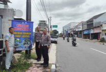 Jasa Raharja Cabang Magelang dan Satlantas Polres Magelang Kota Melaksanakan Pemasangan Papan Peringatan di Titik Rawan Kecelakaan jasa raharja jateng