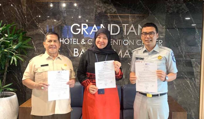 dengan Hotel Grand Tan Banjarmasin