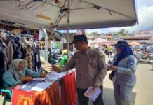 Jasa Raharja Cabang Bukittinggi Bersama Mitra Kerja Samsat Bukittinggi Bagikan Brosur Pemutihan Pajak Kendaraan di Pasar Aur Kuning jasa raharja sumbar