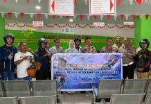 Hari Keselamatan Transportasi Tahun 2025 Jasa Raharja Bagikan Helm Gratis Untuk Pembayar Pajak Ranmor Di Kantor Samsat jasa raharja riau